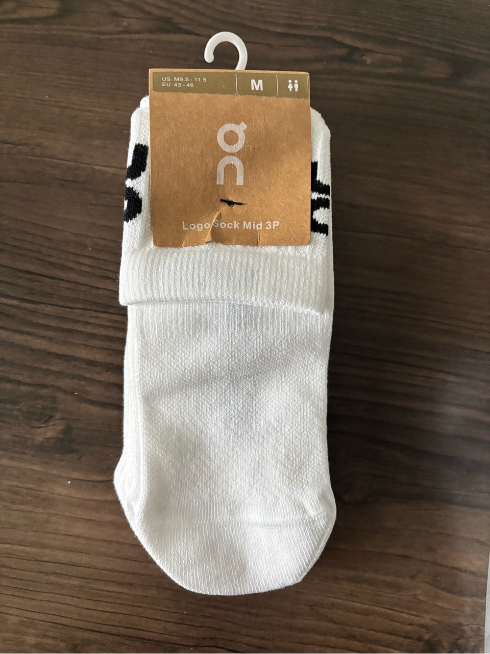 On Running White Athletic Crew Socks with Black Logo - Mid Cut Pack